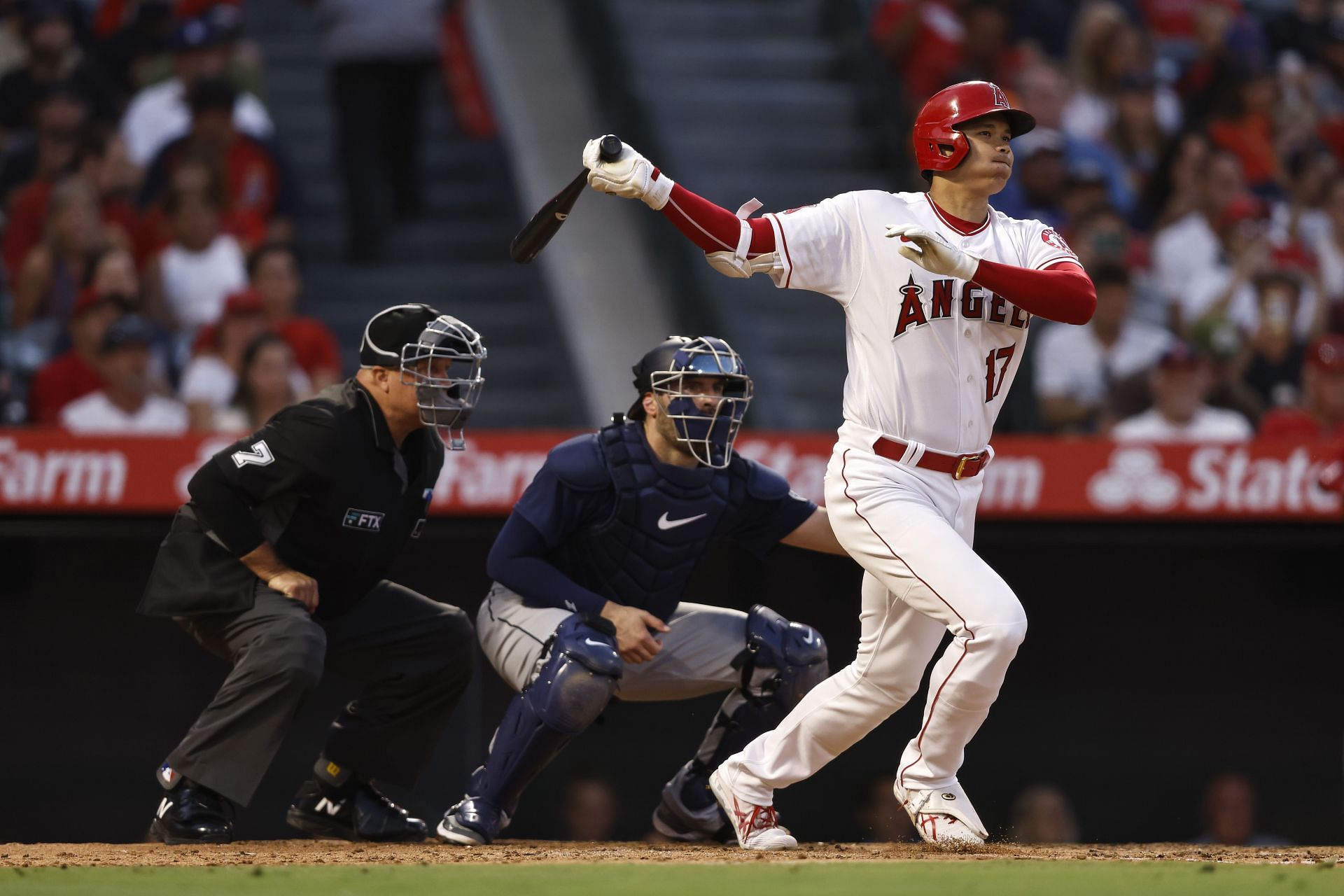 Shohei Ohtani hits a ball down the right field line during a Seattle Mariners v Los Angeles Angels game.